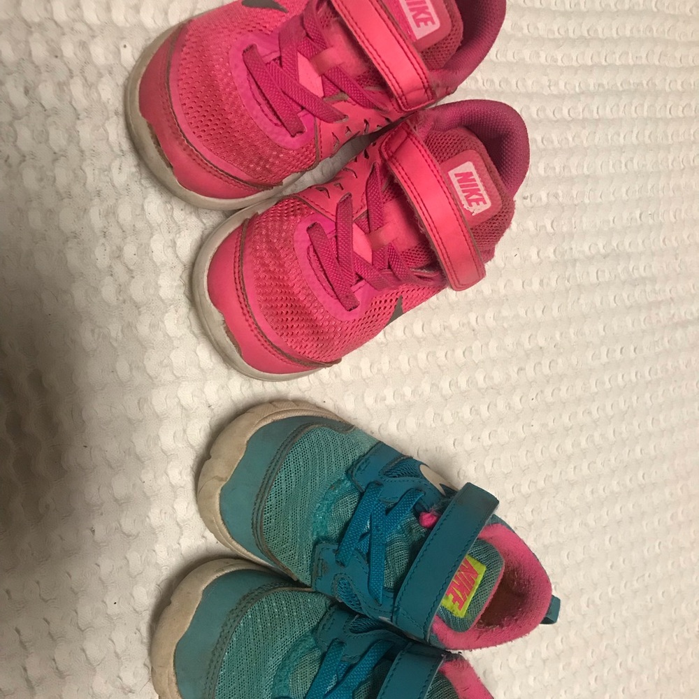 2 pairs of Girls Nike sneakers